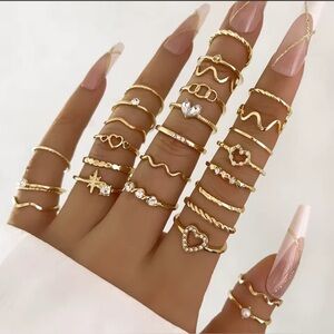 28 Piece Elegant Gold-Tone Heart and Wave Ring Collection